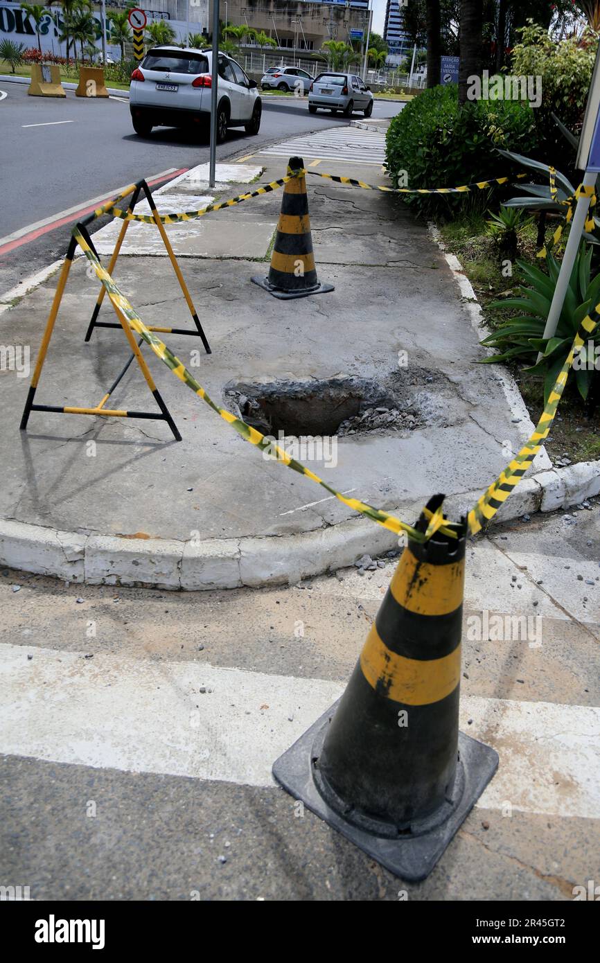 salvador, bahia, brazil may 16, 2023 cone and safety tape local mark with hole on the