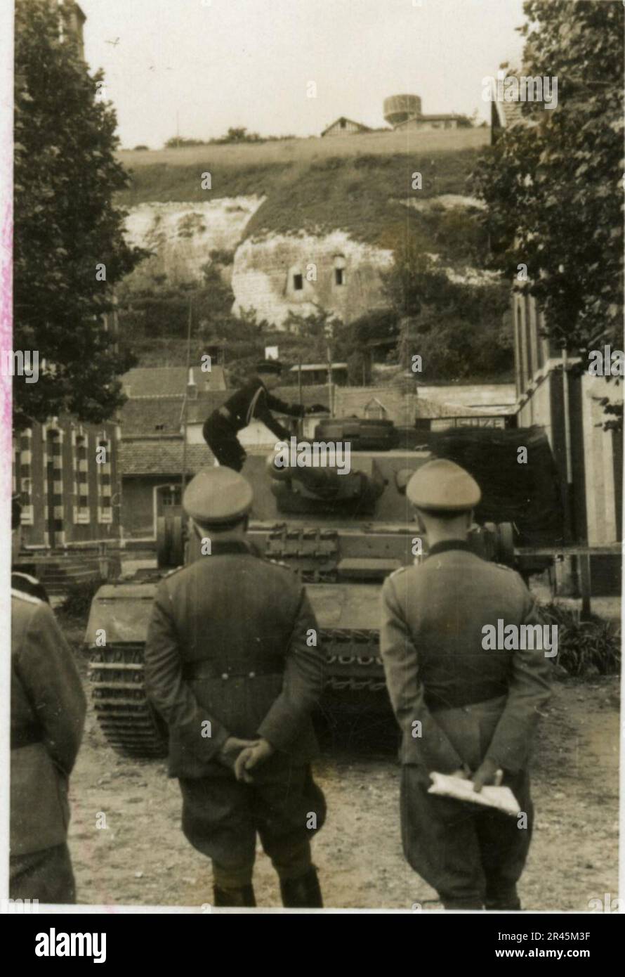 Augustin, Paul, SS photographer of the Leibstandarte Adolf Hitler. Documented events in Holland, France (1940) and Russia (1941-43). French prisoners of war, bridging building, anti-tank gun crew, machine gun team, vehicle convoys on the road and in cities, Belgian forts, prisoner of war camp, scenes of destruction, post-combat and occupation activities, training and sports activities, Hitler Youth and Bund Deutscher Mädel (League of German Girls) sports activities and cultural performances, unit formations and ceremonies, field hospital, individual and group formal photos, light anti-aircraft Stock Photo