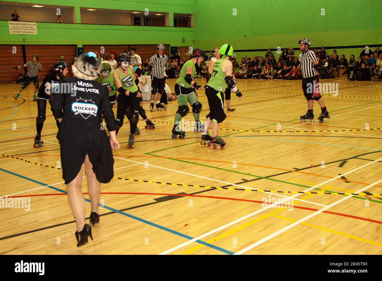 Highly involved Brighton Rockers coach Mass Janeycide at a roller derby bout in the Kelsey Kerridge sports centre Cambridge Stock Photo