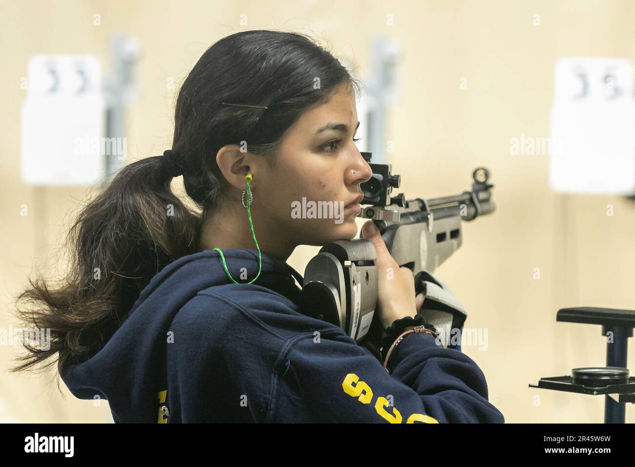 Jasmine Lopez, an Army JROTC Cadet from North Brunswick High School, takes a moment to mentally prepare before shooting at the 2023 JROTC National Air Rifle Championship on March 25 at Camp Perry, Ohio. The competition is held March 23-25 and features the best marksmen from all-service JROTC programs across the country competing in Sporter and Precision shooting events. | Photo by Sarah Windmueller, U.S. Army Cadet Command Public Affairs Stock Photo