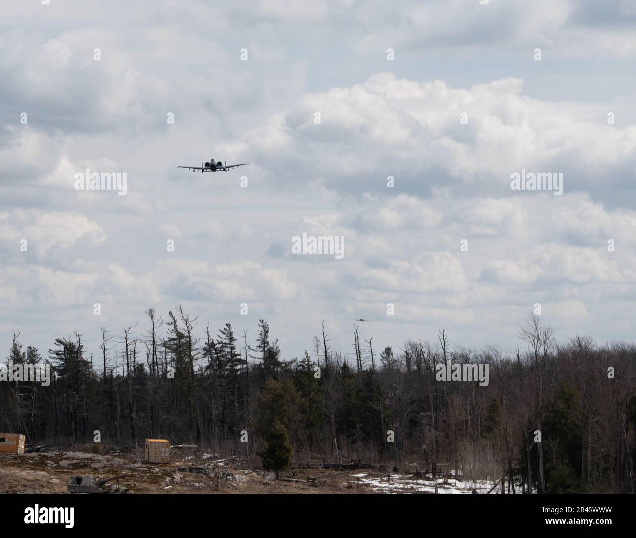 A-10 Thunderbolt IIs from the 175th Wing, Baltimore, M.d., displays a show of force during a close air support exercise on Range 48, Fort Drum, N.y. March 29, 2023. The close air support training was conducted by members of the 274th Air Support Operations Squadron and members of the Brazilian Air Force Para-SAR Squadron. Stock Photo