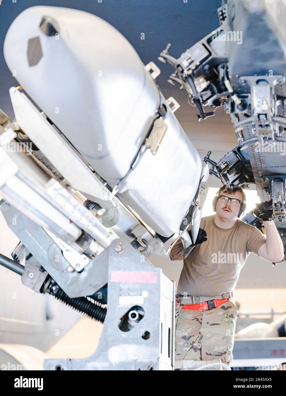 https://c8.alamy.com/comp/2R45XX5/senior-airman-michael-becker-96th-aircraft-maintenance-unit-amu-weapons-load-crew-member-gives-directions-to-other-load-crew-members-during-the-2nd-maintenance-group-annual-weapons-load-competition-at-barksdale-air-force-base-la-jan-11-2023-this-annual-event-features-the-two-highest-performance-load-crews-from-the-past-year-competing-for-the-best-score-2R45XX5.jpg