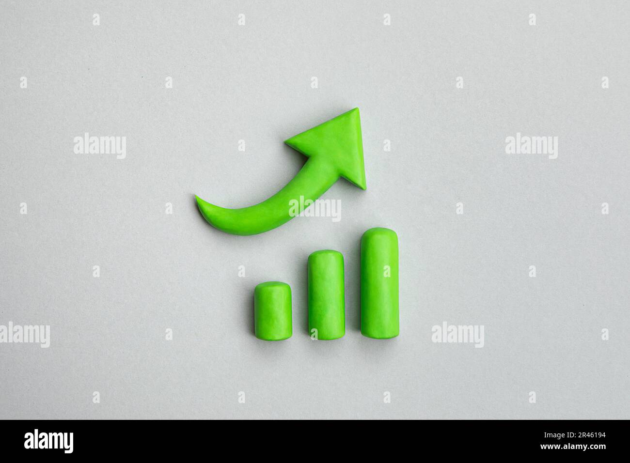 Business growth concept, 3d green arrow pointing up and chart indicating development. Three dimensional simple signs. Financial prosperity, business p Stock Photo