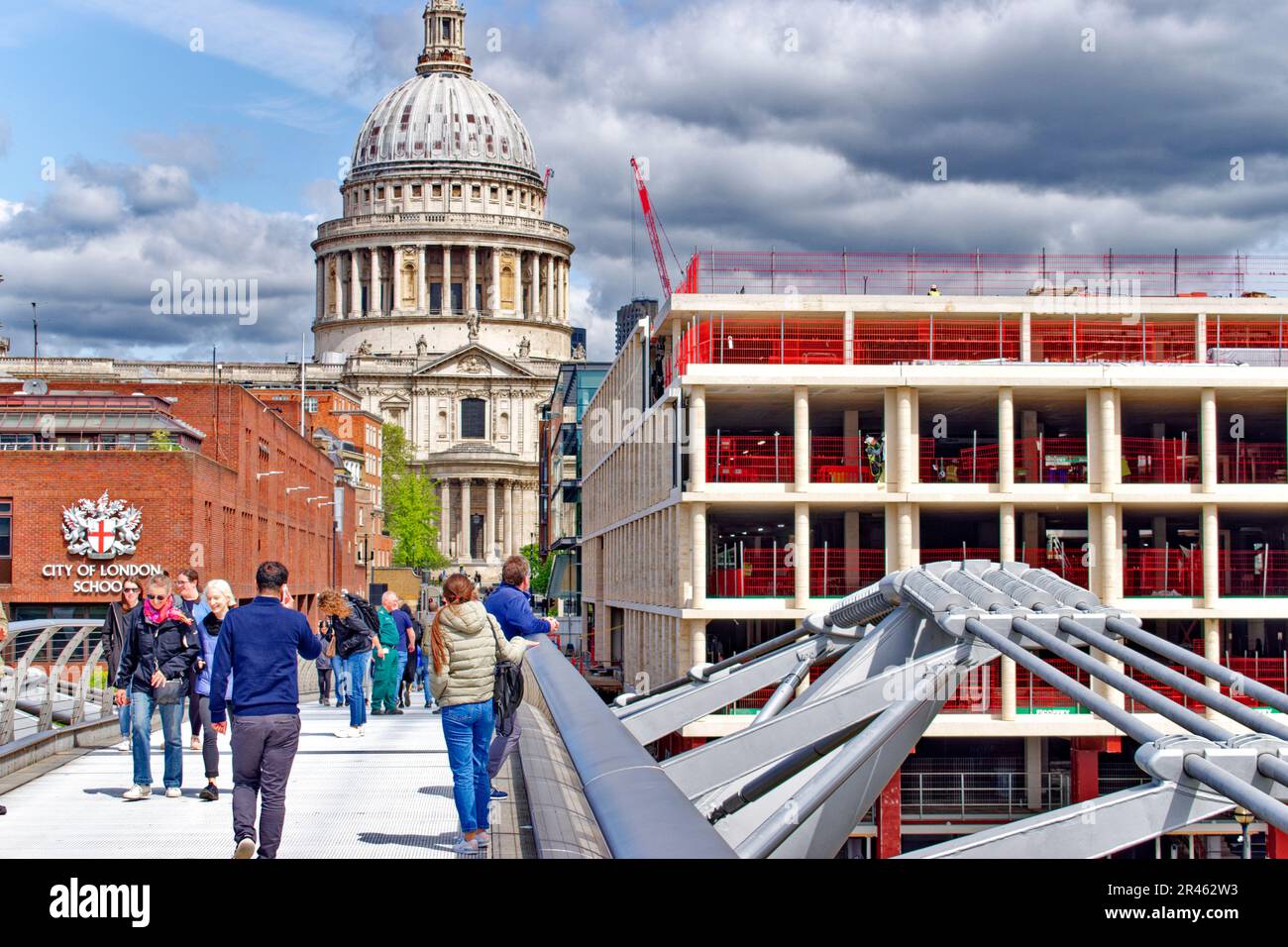 London St Pauls Cathedral the Millennium Footbridge City of London School and a new building construction Stock Photo