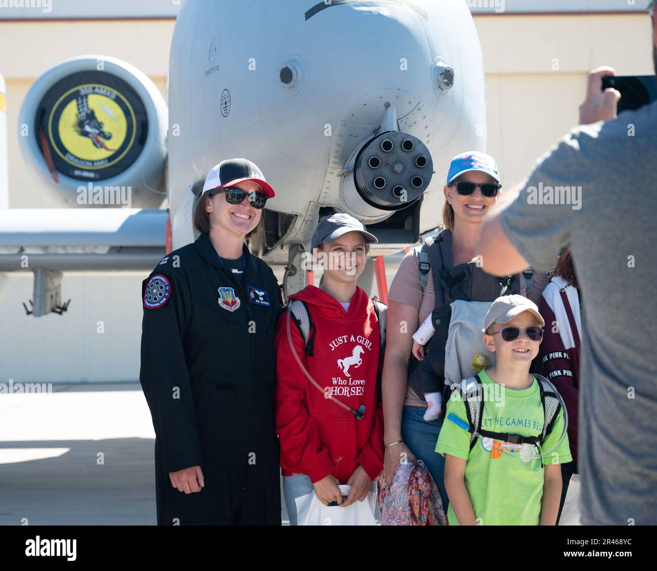 U.S. Air Force Capt. Lindsay “MAD” Johnson, A-10C Thunderbolt II Demonstration team commander and pilot, interacts with air show attendees at Davis-Monthan Air Force Base, Arizona, March 26, 2023. The airshow was open to the public as a way to connect the base and local community while also highlighting the mission and capabilities of the U.S. Air Force. Stock Photo