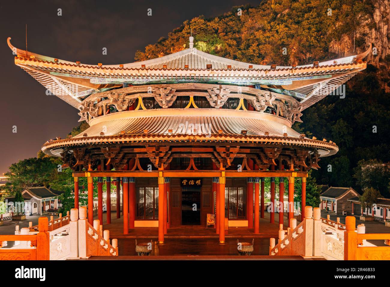 An awe-inspiring view of Minglun Hall of Confucian Temple in Liuzhou, Guangxi, China illuminated by the night sky Stock Photo