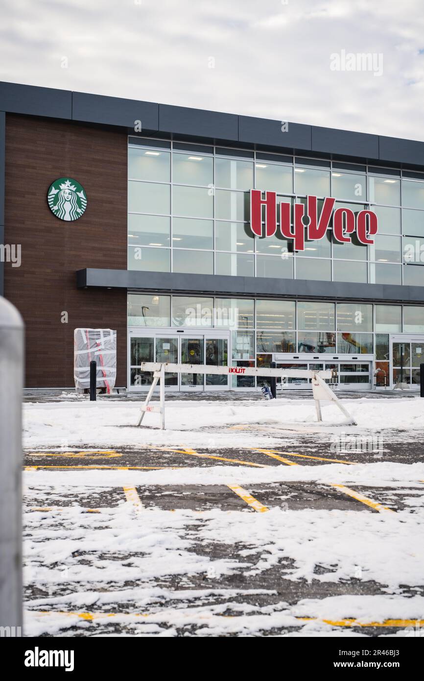 The empty snowy parking lot in front of the Hy-Vee Store. Janesville ...
