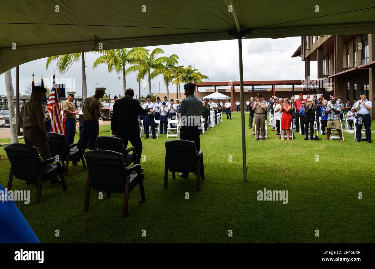 Guests give a Mr. Johnie Webb, Operation Homecoming ceremony guest speaker, a standing ovation after he spoke during a ceremony for the 50th anniversary of Operation Homecoming at Joint Base Pearl Harbor-Hickam, Hawaii, March 28, 2023. Webb spent nearly 50 years spearheading the search for personnel missing in action from America’s wars. Stock Photo