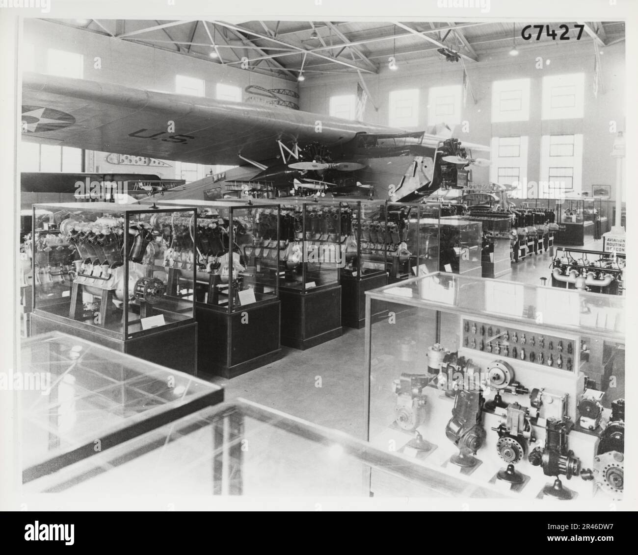 Aircraft, engines and instruments on display inside the museum Building 12 along with DeHaviland DH-4 and Fokker C-2 in 1937. Stock Photo