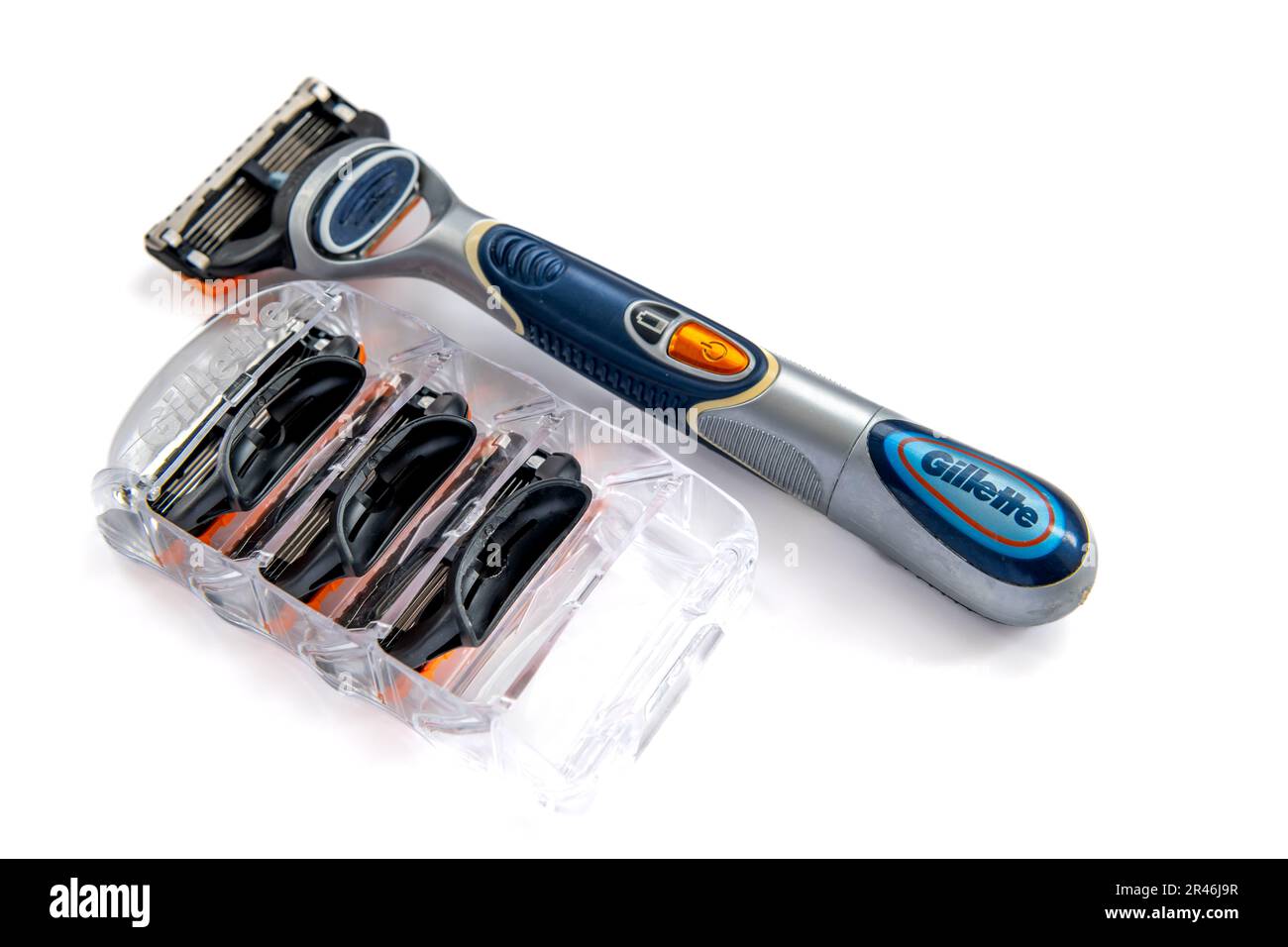 London. UK- 05.21.2023. A Gillette razor and replacement blades isolated in white. Stock Photo