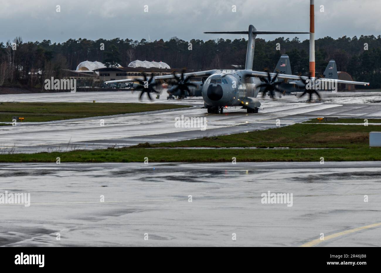 A German air force A-400M Atlas aircraft prepares for take-off at Ramstein Air Base, Germany, March 31, 2023. Training objectives for International Interfly Week included establishing standard operating procedures between various aircraft, maximizing defensive capabilities at various points of flying formations, and developing contingencies for completing airdrops in normal and adverse weather conditions. Stock Photo