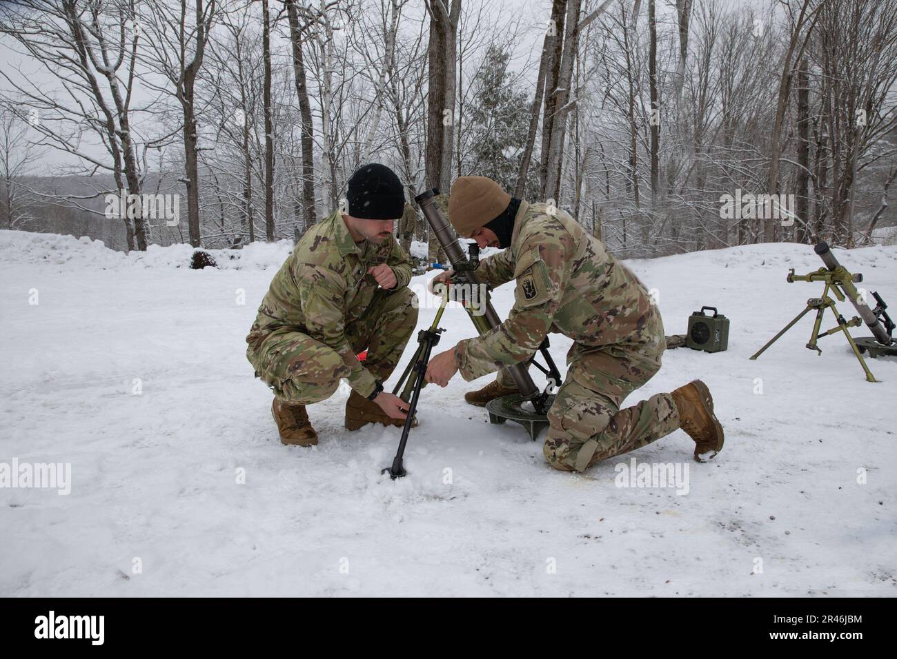 U.S. Army Spc. Miles Hiler, gun team leader, left, and Spc. Leo