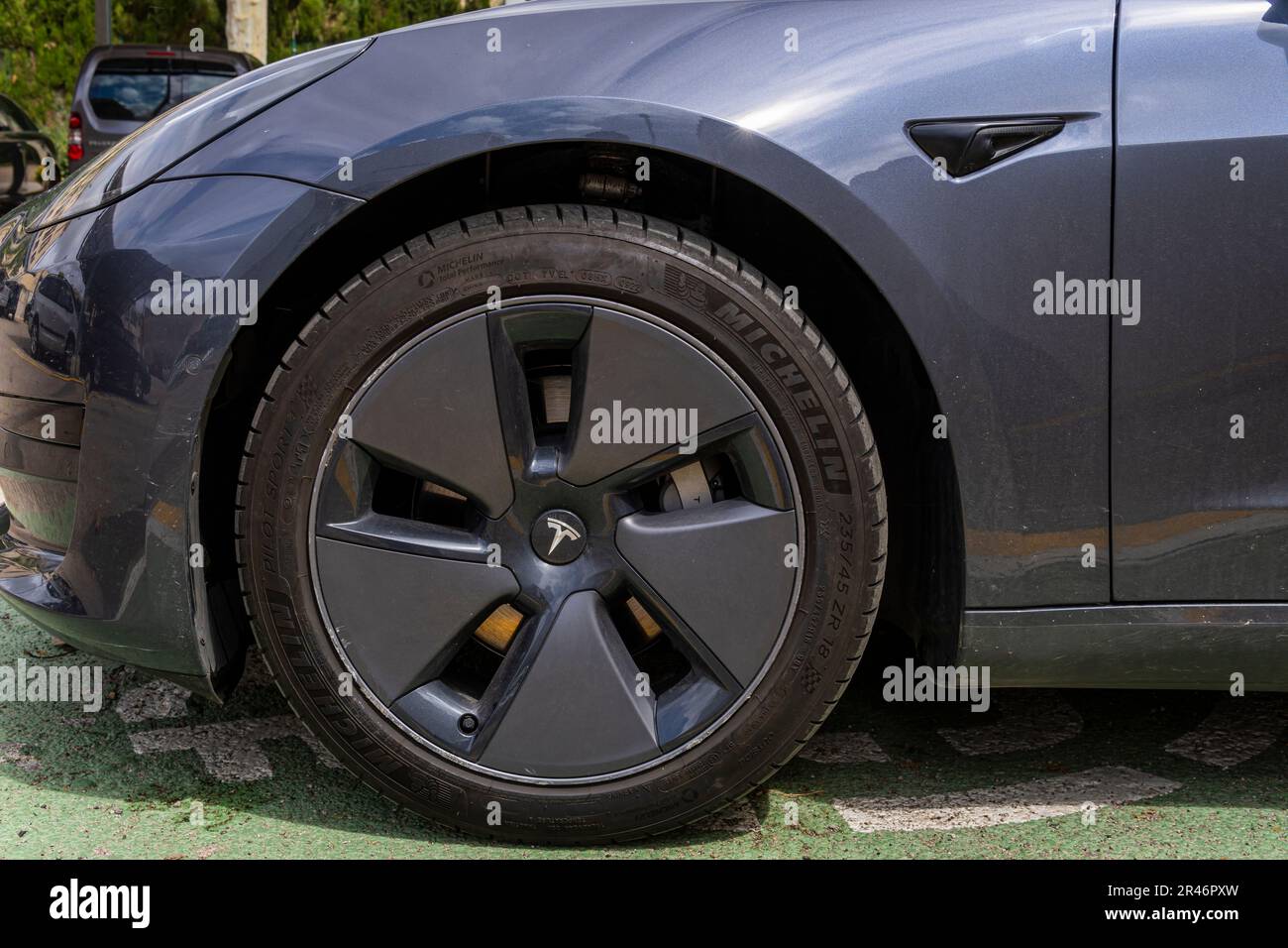 Manacor, Spain; may 06 2023 Dark gray Tesla electric car, recharging
