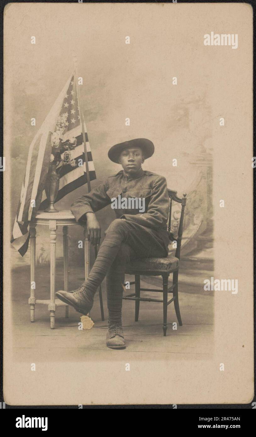 Unidentified African American soldier in uniform and campaign hat ...
