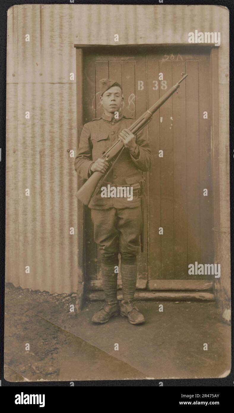 Unidentified African American soldier in uniform and overseas cap with ...