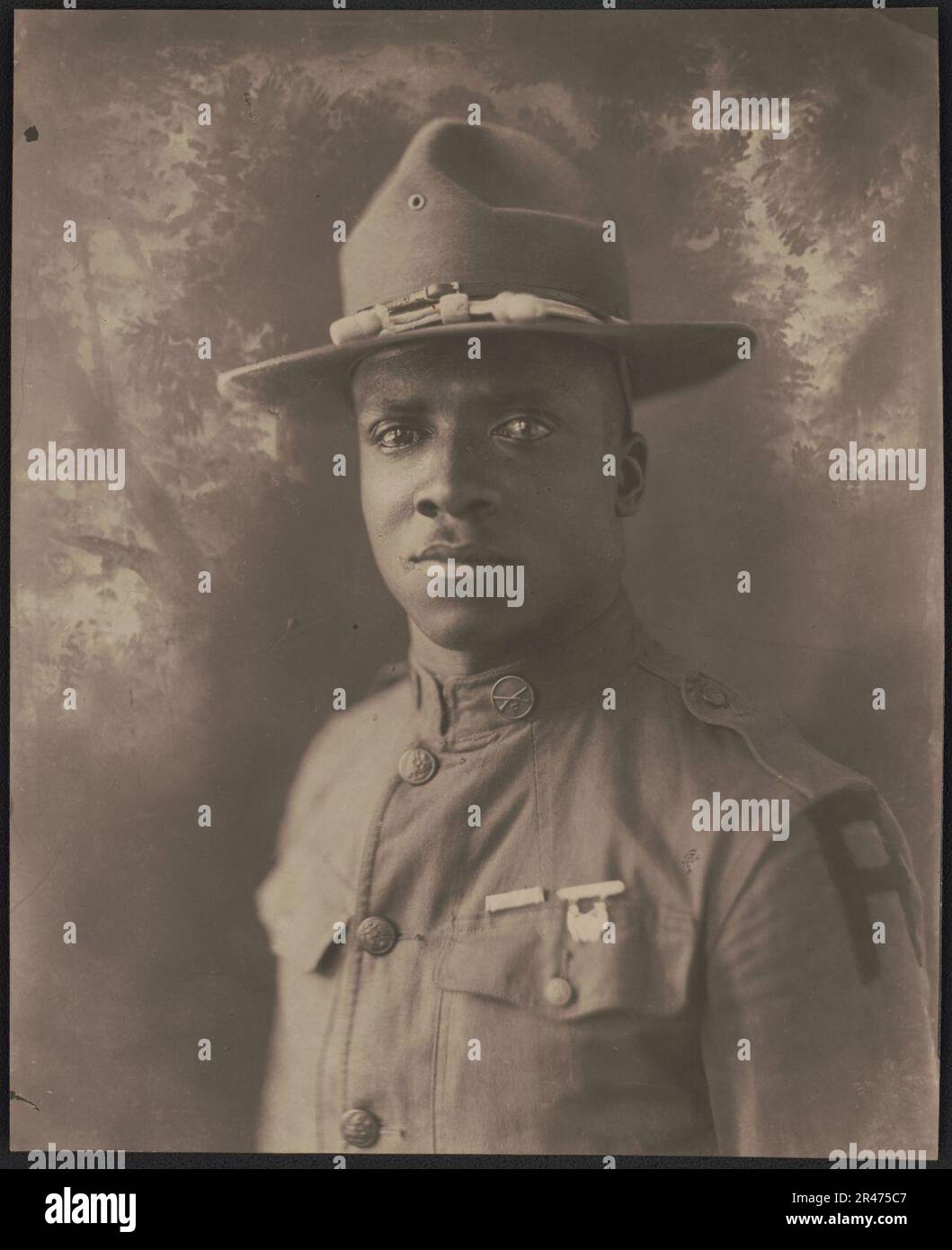Unidentified African American soldier in uniform with First Army ...