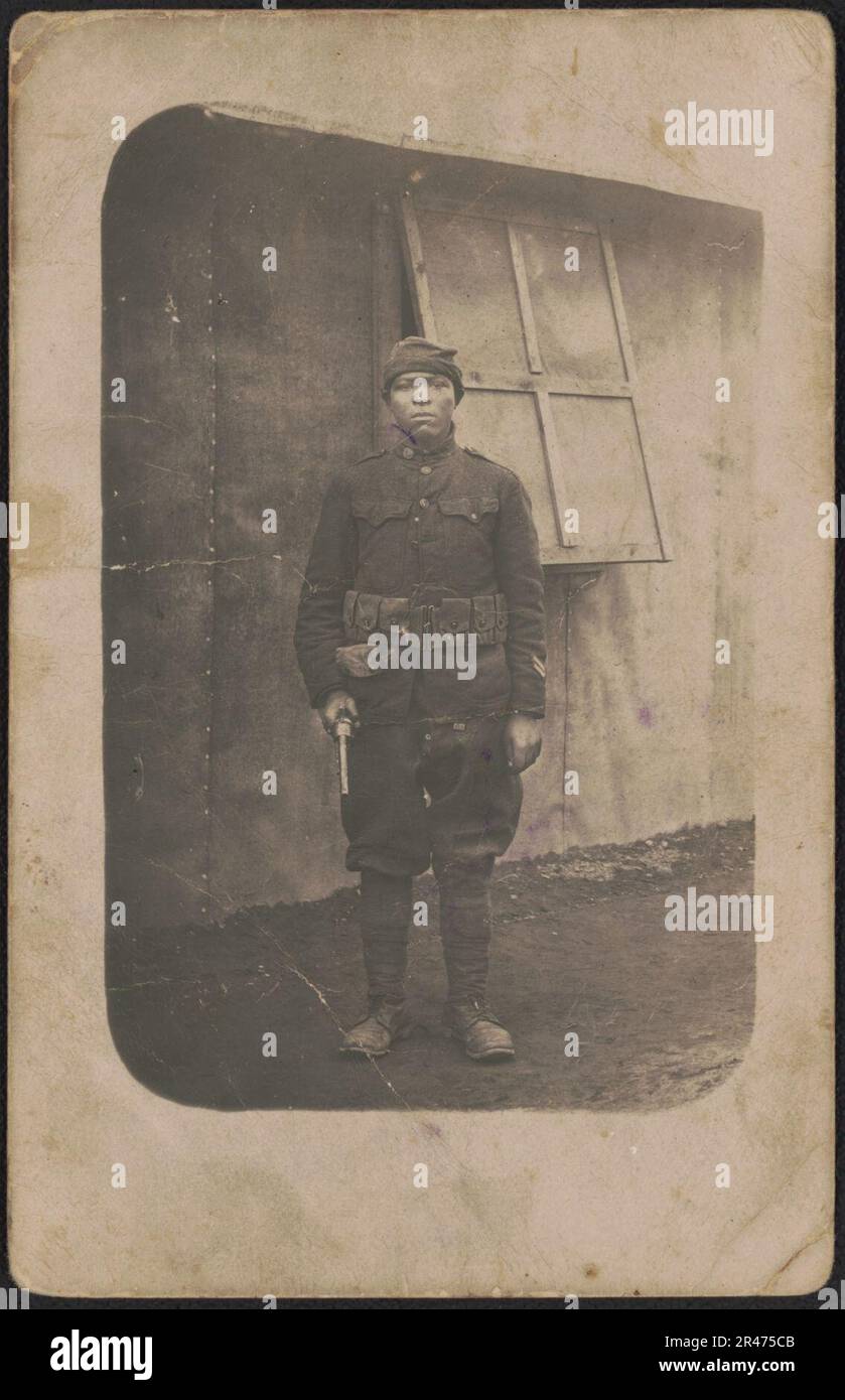 Unidentified African American soldier in uniform, unofficial cap, and ...