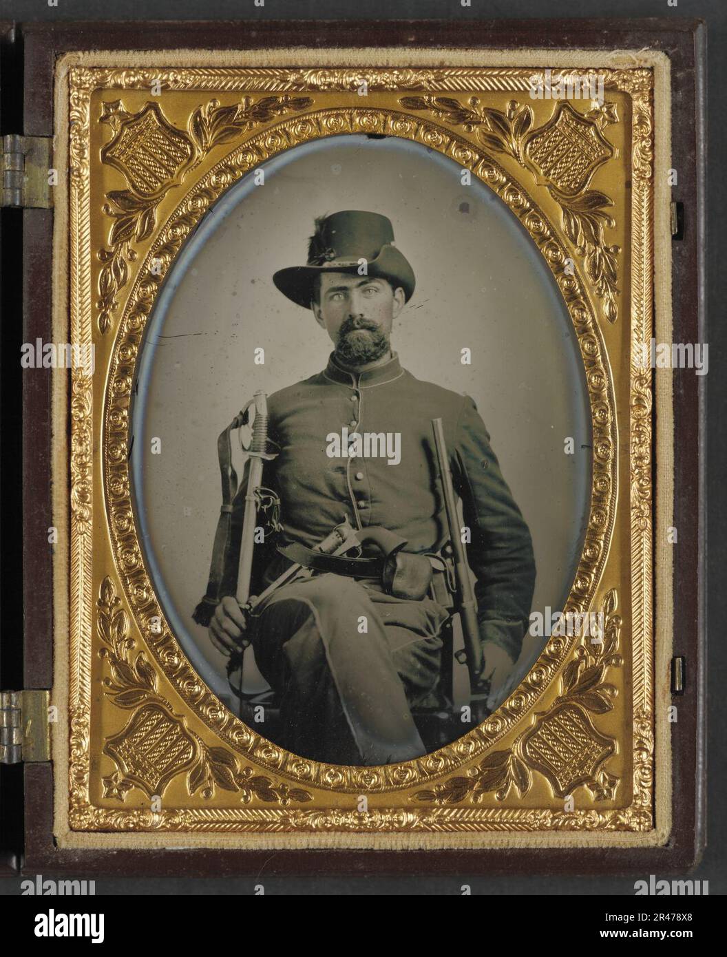 Unidentified soldier in Union cavalry uniform with cavalry sword, Colt ...