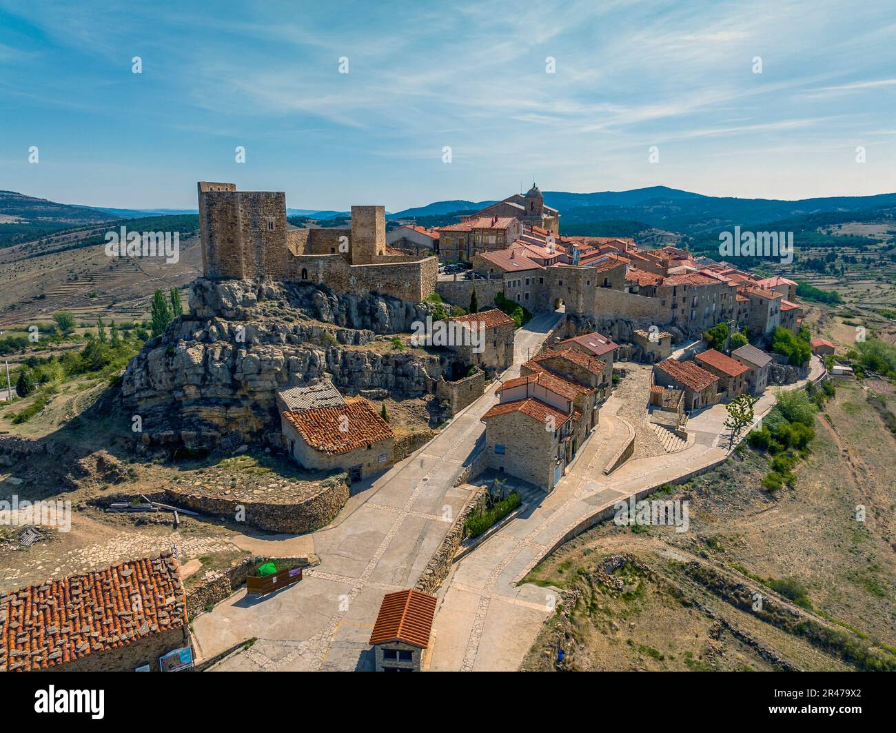 Puertomingalvo province of Teruel listed as beautiful towns of Spain  Front panoramic aerial view entrance and castle Stock Photo