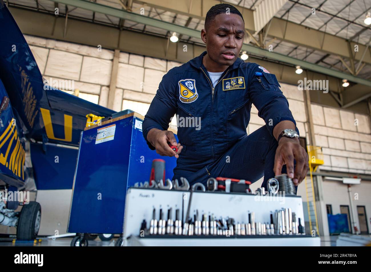230202-N-DM308-5653 EL CENTRO, Calif. (Feb. 2, 2023) Logistics Specialist 2nd Class Brian Hubbard, assigned to the U.S. Navy Flight Demonstration Squadron, the Blue Angels, takes inventory of tools onboard Naval Air Facility (NAF) El Centro. The Blue Angels are currently conducting winter training at NAF El Centro, California, in preparation for the upcoming 2023 air show season. Stock Photo
