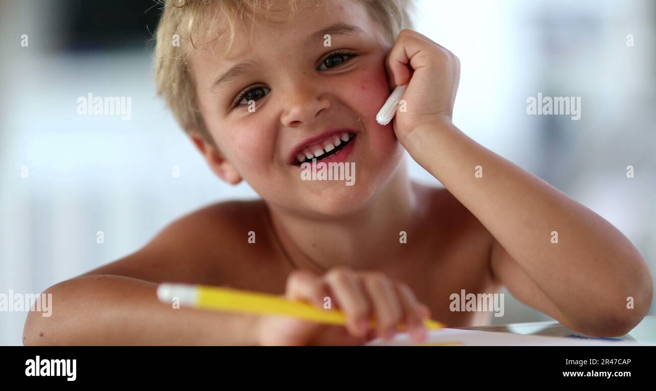 Cute bashful shy toddler boy face being adorable Stock Photo - Alamy