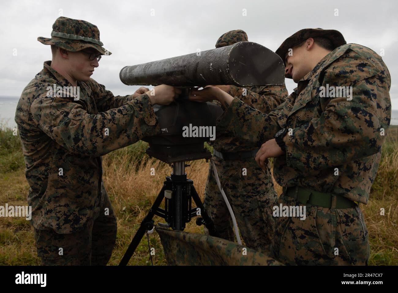 U.S. Marines all surveillance sensor operators with command element, 31st Marine Expeditionary Unit, set up a Furuno 8255 maritime radar system during an expeditionary advance base operation exercise at W-174, Okinawa, Japan on Feb. 6, 2023.  The EAB exercise reinforced Marines and Sailors abilities to gather maritime and airspace intelligence by employing radars and relaying the information back to commanders aboard the amphibious assault ship USS America (LHA-6). The 31st MEU is operating aboard ships of USS America Amphibious Ready Group in the 7th fleet area of operations to enhance intero Stock Photo