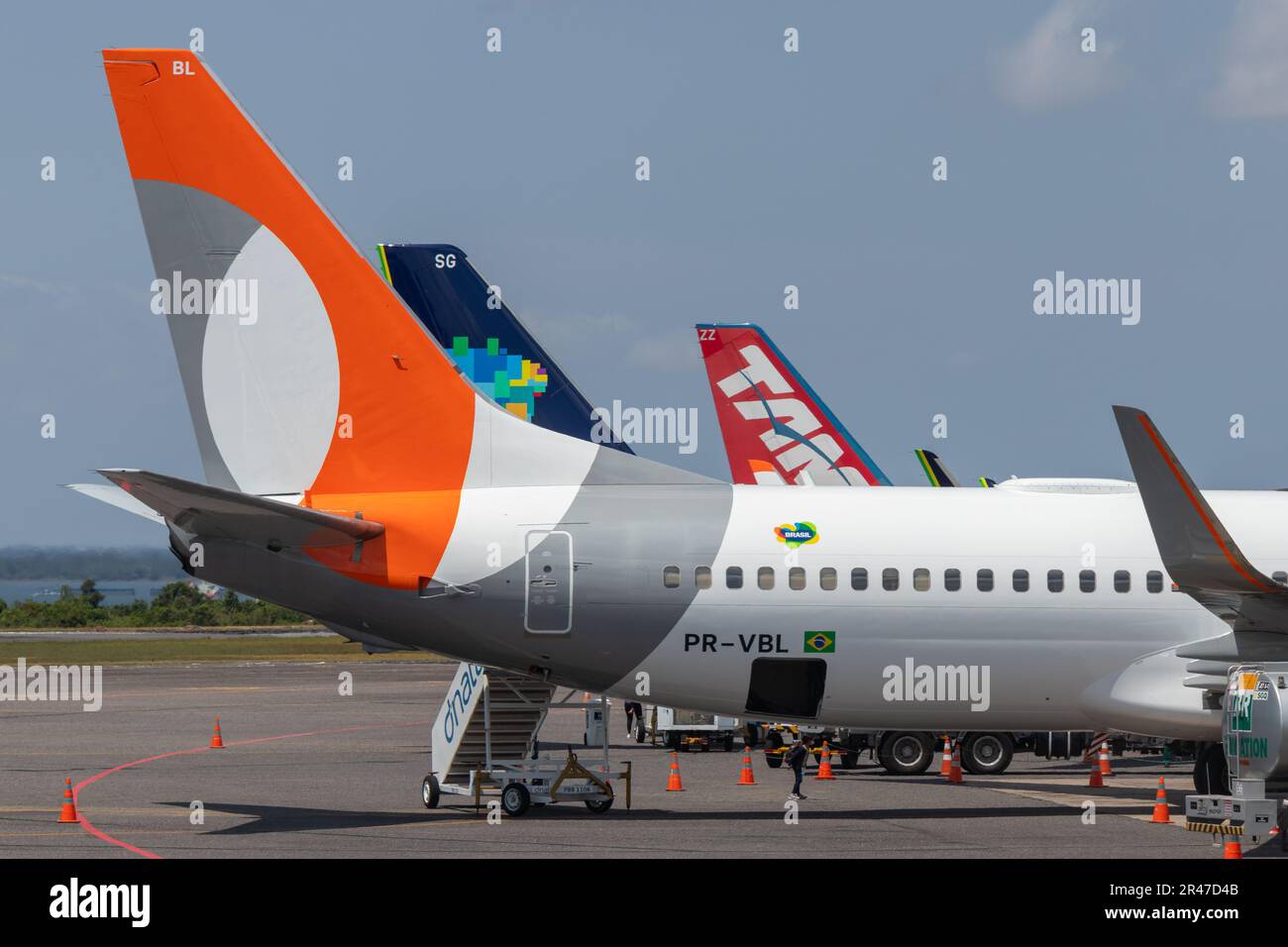 Tails of TAM (LATAM), GOL, and AZUL aircraft. Brazil's three largest airlines. At Santarem Airport (SBSN) Stock Photo