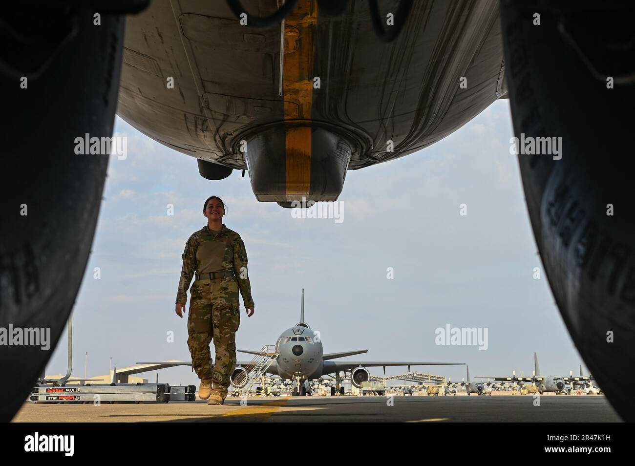 U.S. Air Force Airman 1st Class Jessica Lere, 908th Expeditionary Air Refueling Squadron KC-10 Extender aerial refueling specialist, performs a preflight walkaround inspection within the U.S. Central Command area of responsibility,  March 19,  2023.   The 908th EARS delivers fuel for U.S. and partner nation forces, extending the reach and combat airpower dominance to the region. Stock Photo