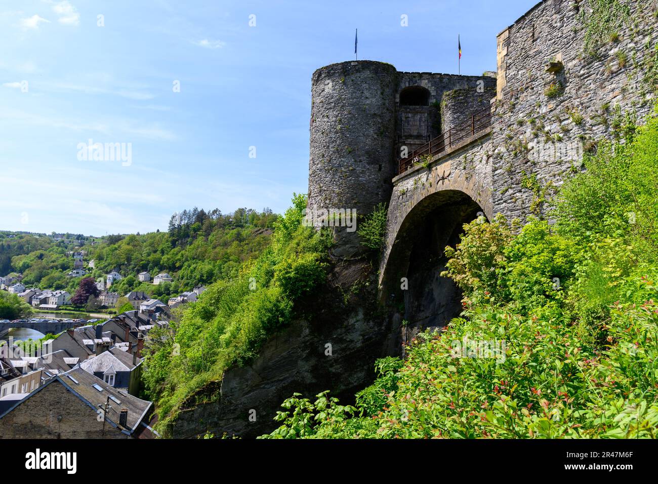 Walking in medieval town Bouillon with fortified castle on rock