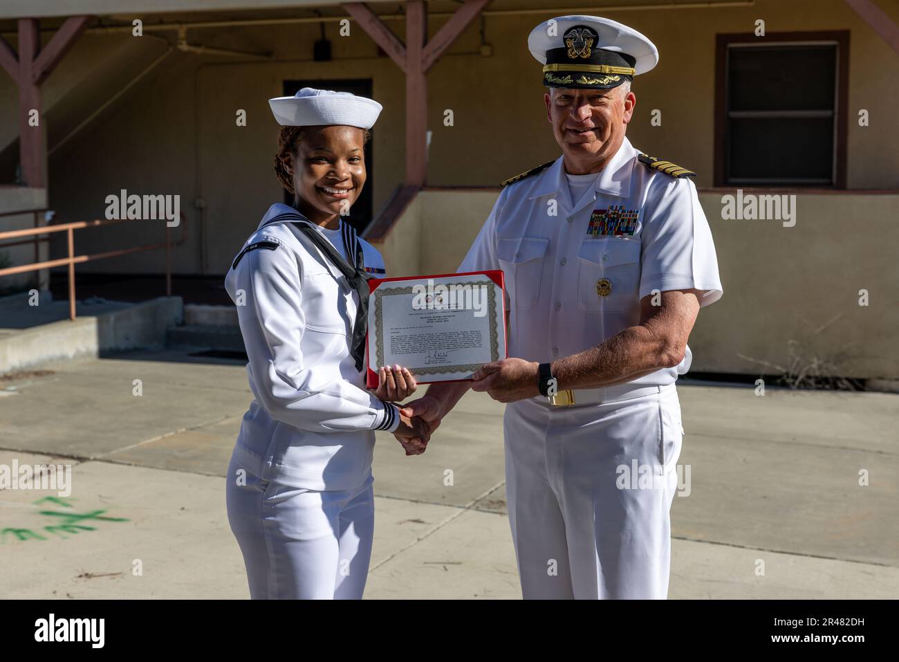 U.S. Navy Petty Officer Second Class Rashida Plummer, left, a religious