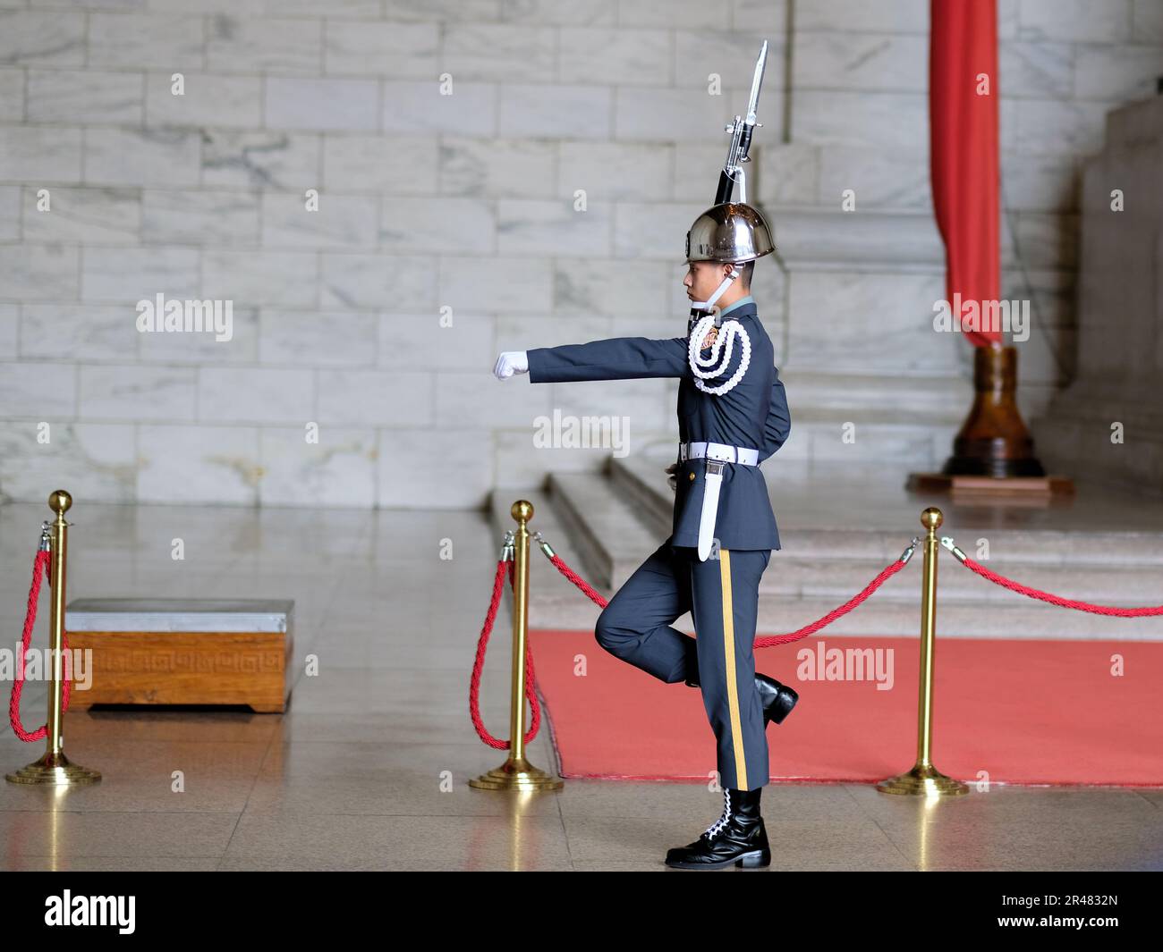 Changing of the guard ceremony at the bronze statue of Chiang Kai-Shek in the main chamber at the Chiang Kai-shek Memorial Hall; Taipei, Taiwan. Stock Photo