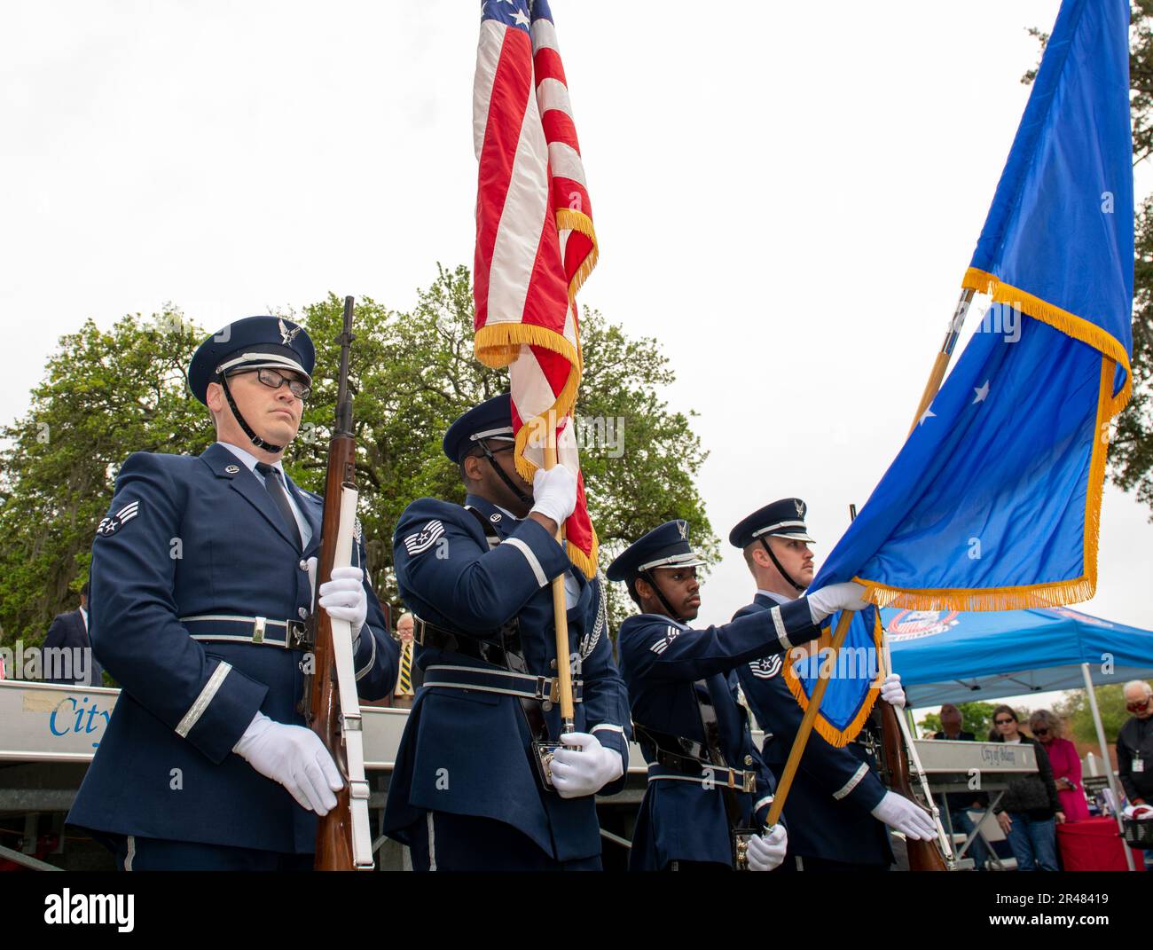 Members of the Keesler Honor Guard present the colors during the ...