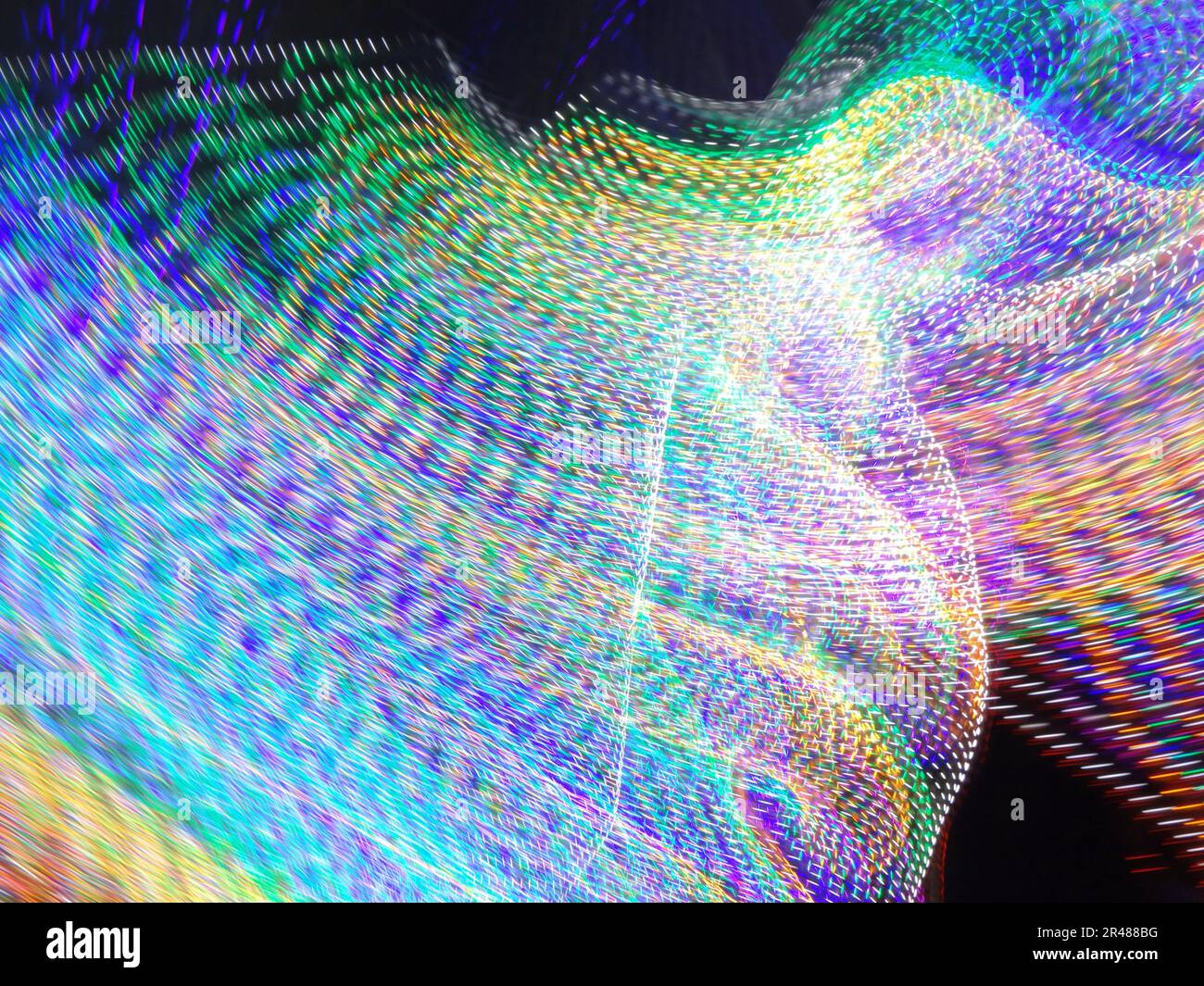A blurred image with a blue patterned background, creating an abstract and dreamy aesthetic Stock Photo