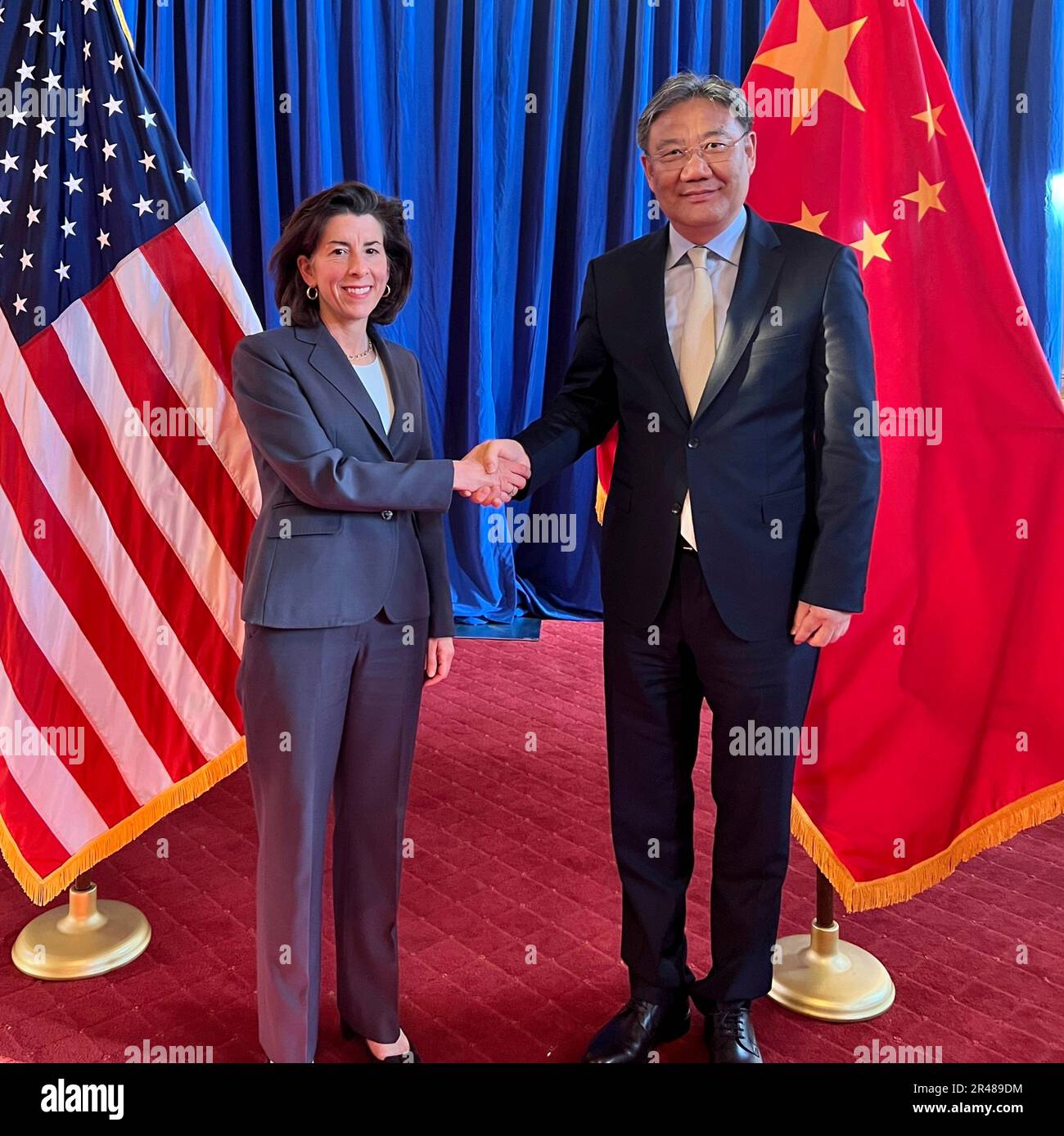 Washington, United States Of America. 26th May, 2023. Washington, United States of America. 26 May, 2023. U.S Commerce Secretary Gina Raimondo, left, welcomes Chinese Minister of Commerce Wang Wentao before the start of a bilateral meeting at the Commerce Department, May 26, 2023 in Washington, DC Credit: Handout/Commerce Department Photo/Alamy Live News Stock Photo
