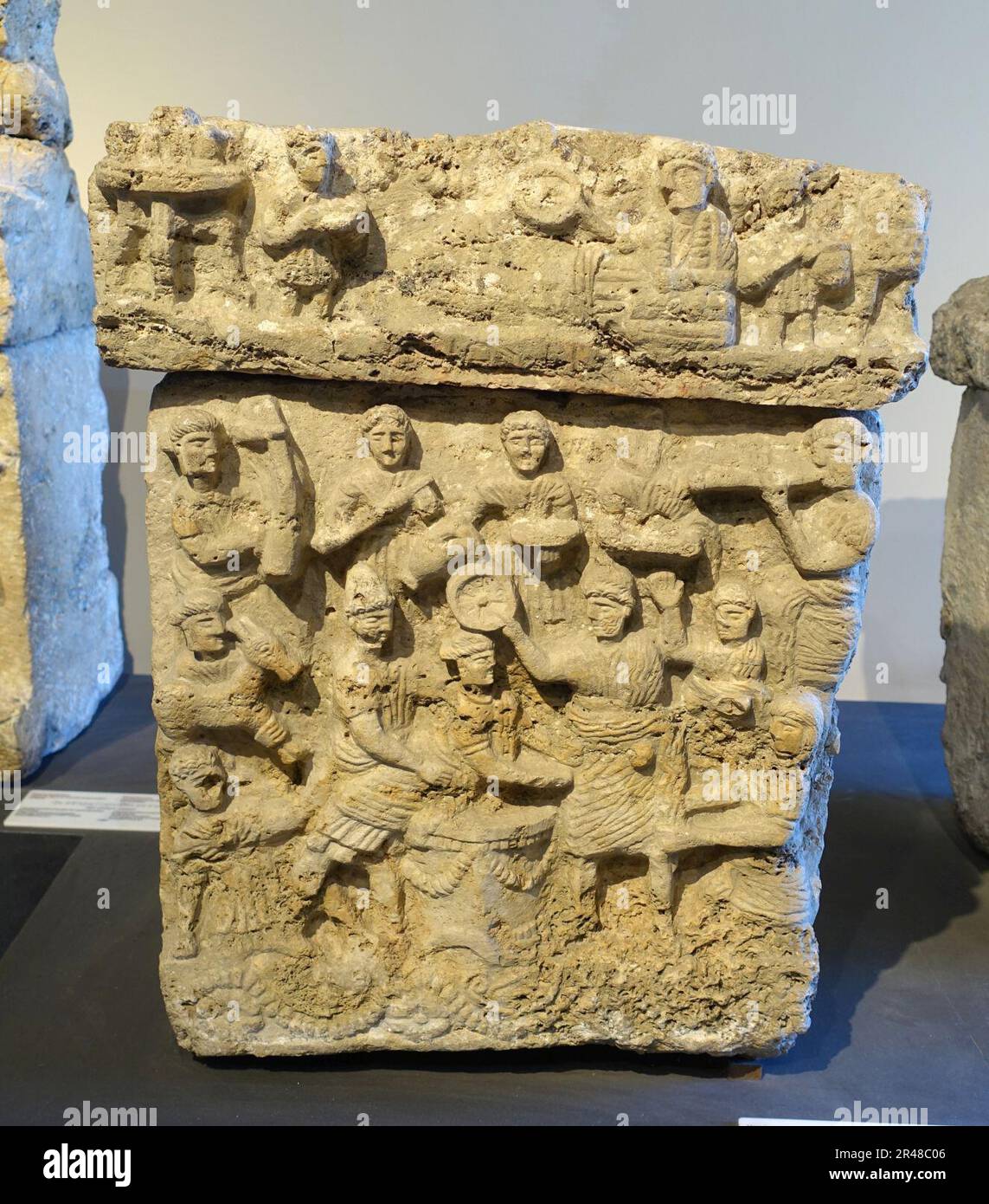 Urn with banquet scene and sacrifice of Iphigenia, 2nd half off the 2nd century BC, travertine, inv. 13902 Stock Photo