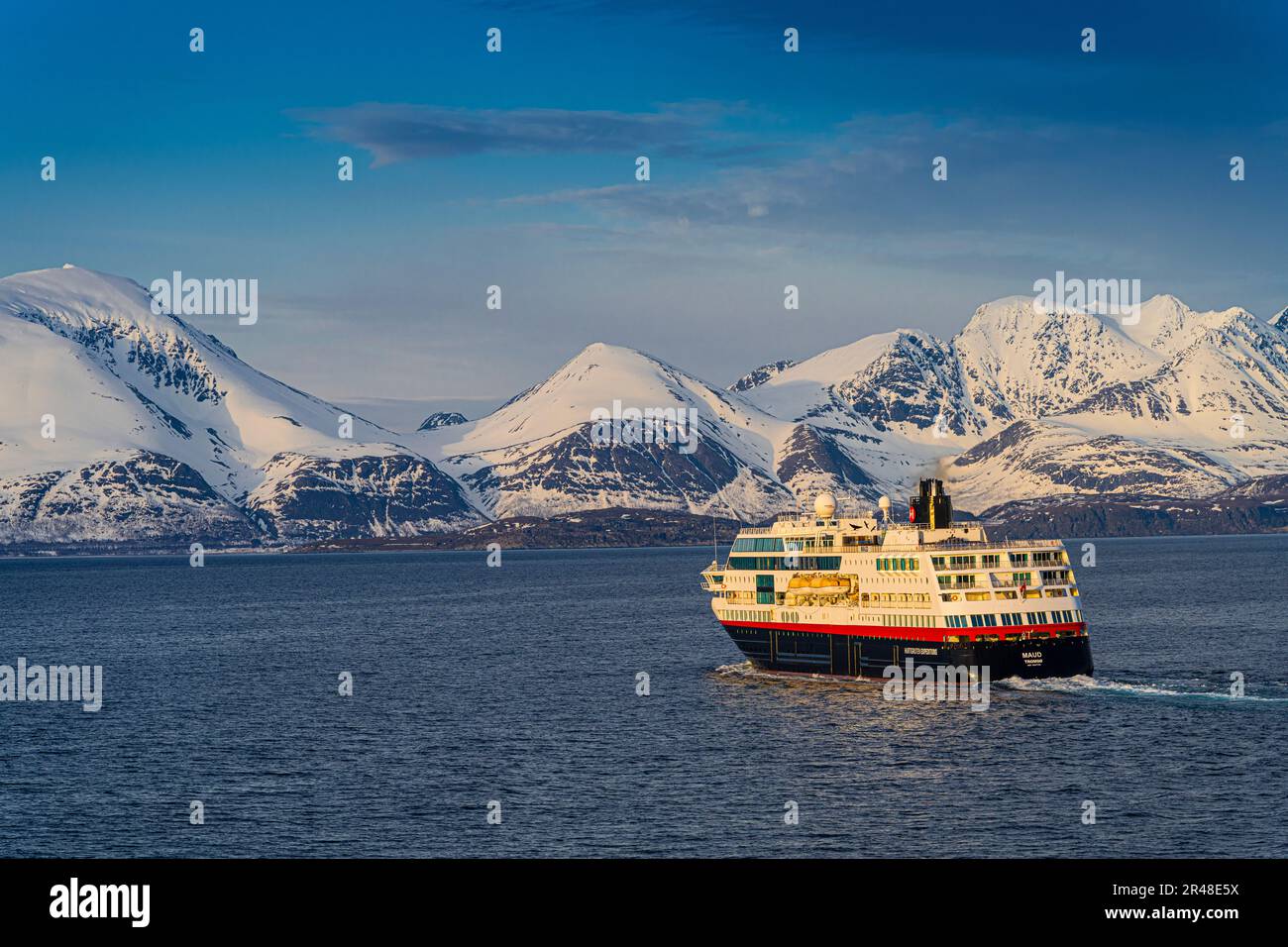 The Coastal Express, Hurtigruten, heading north along the Norwegian coast. Stock Photo