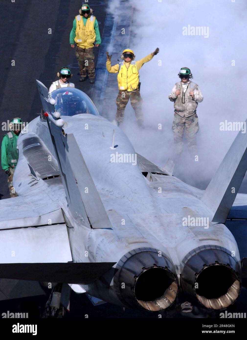 US Navy F-A-18 moves into position over catapult before launch Stock ...