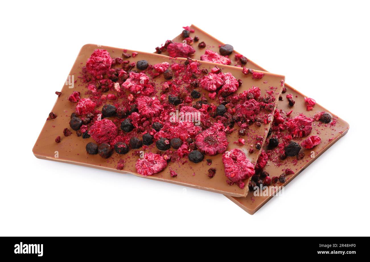 Chocolate bars with freeze dried berries on white background Stock ...