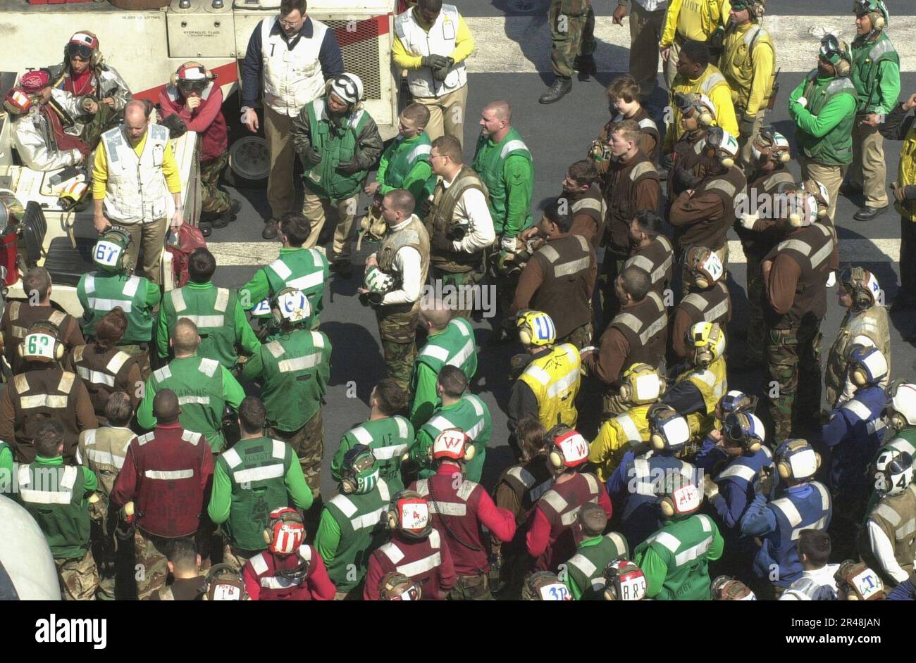 US Navy USS Kitty Hawk flight deck personnel receive preflight