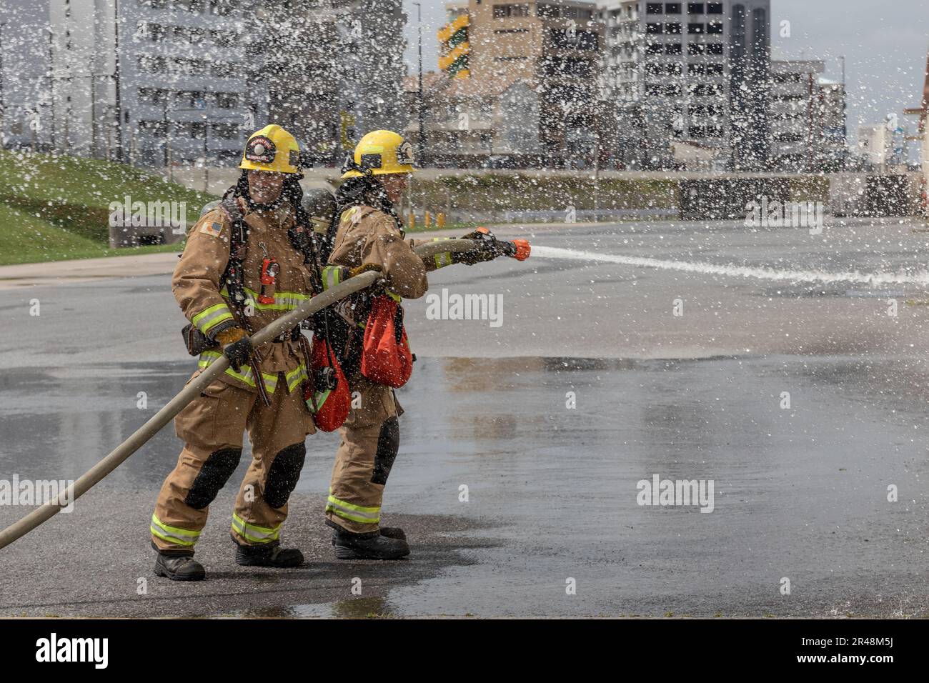 Michael madsen a fire captain left and koya higa right both with