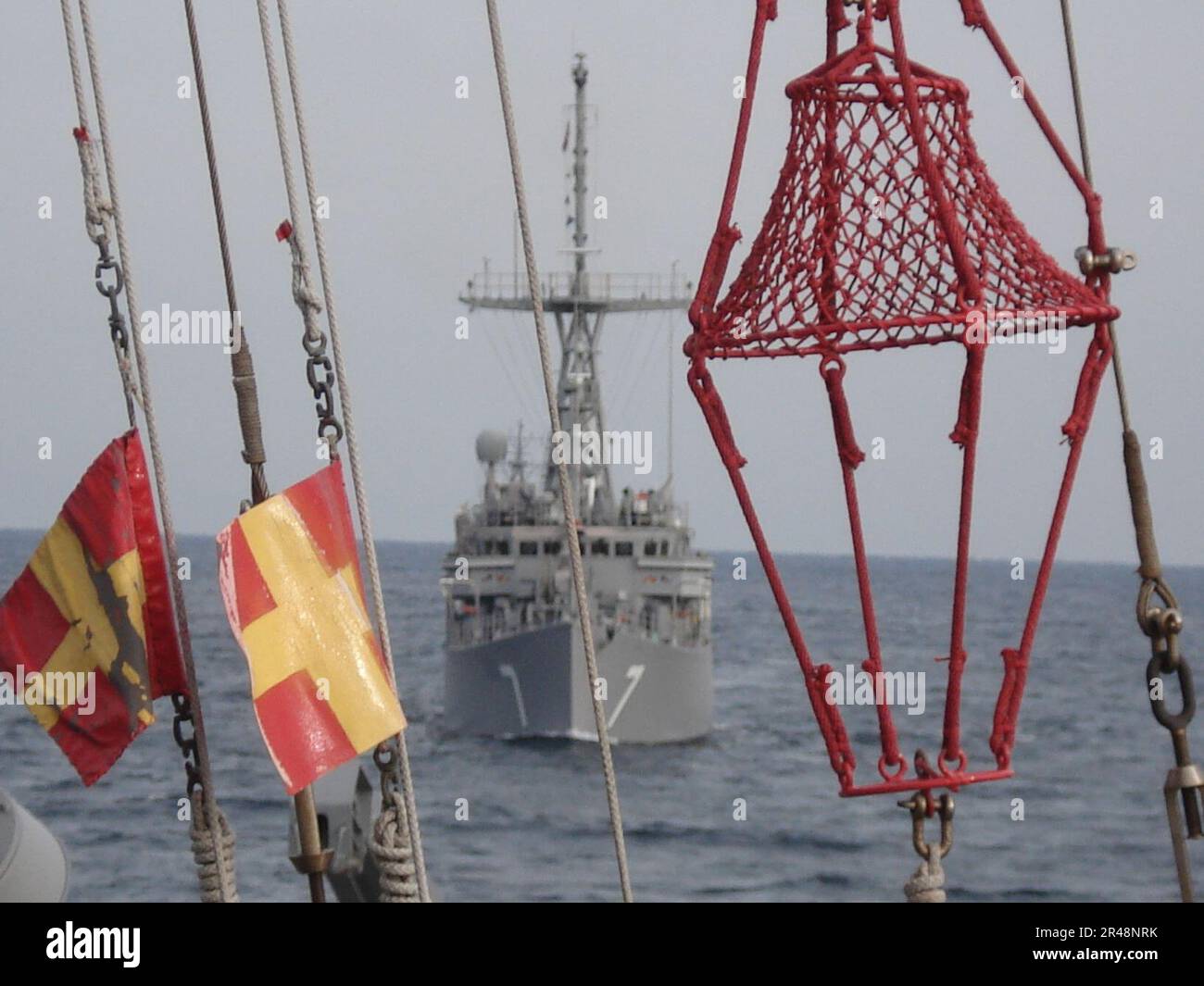 US Navy Mine warfare ship USS Patriot (MCM 7) follows JDS Hachijo (MSO ...