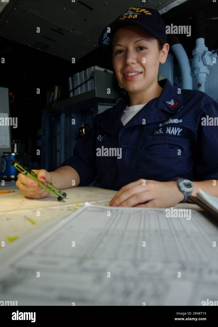 US Navy Quartermaster Second Class Jenny Reid stands her duties as the Quartermaster of the