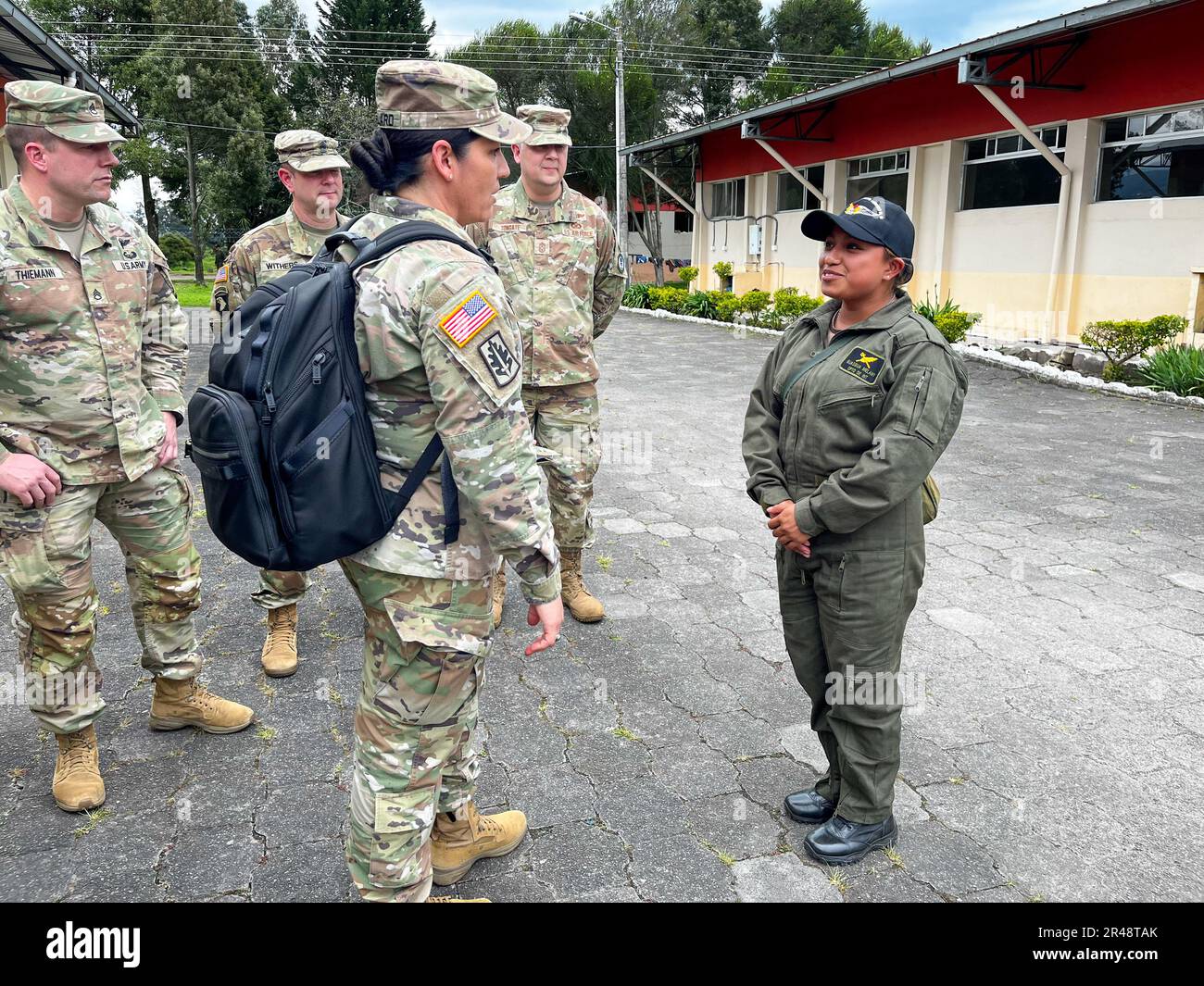 Members of the Kentucky National Guard tour the Brigada de Aviacion del Ejercito Nro. 15 'Paquisha' with members of the Ecuadorian Armed Forces during the Senior Enlisted Seminar March 22, 2023 in Quito, Ecuador. During the seminar, the participants exchanged best-practices on topics involving non-commisioned officer competencies, capabilities and leadership responsibilities. (Submitted photos) Stock Photo