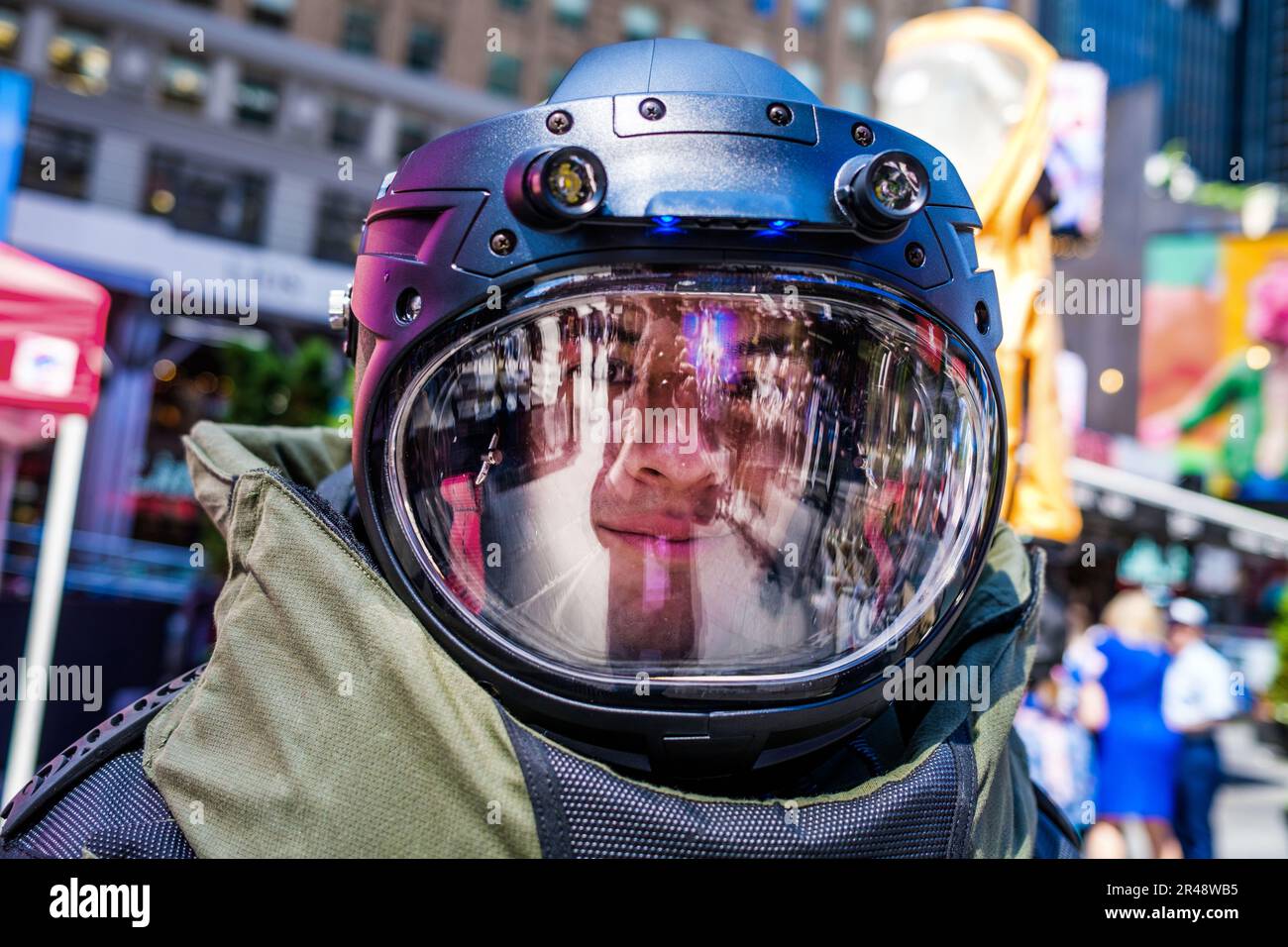 New York, New York, USA. 26th May, 2023. US Marine with ordance disposal suit in Times Square during Fleet Week NYC 2023. The Parade of Ships kicksed off on the Hudson River as naval vessels from the US, UK, Canada and Italy along with thousands of sailors, coast guard and marines. The week long annual celebration of events and performances with men and women in white all over city streets is a welcome sight for New Yorkers. (Credit Image: © Milo Hess/ZUMA Press Wire) EDITORIAL USAGE ONLY! Not for Commercial USAGE! Stock Photo