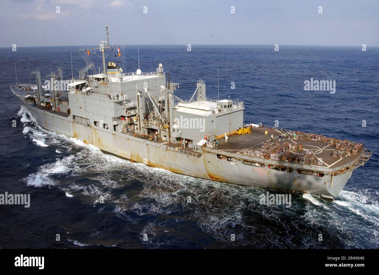 US Navy USS Kitty Hawk prepares to pull alongside the combat stores ship USNS San Jose (T-AFS 7) to participate in an underway replenishment (UNREP) Stock Photo