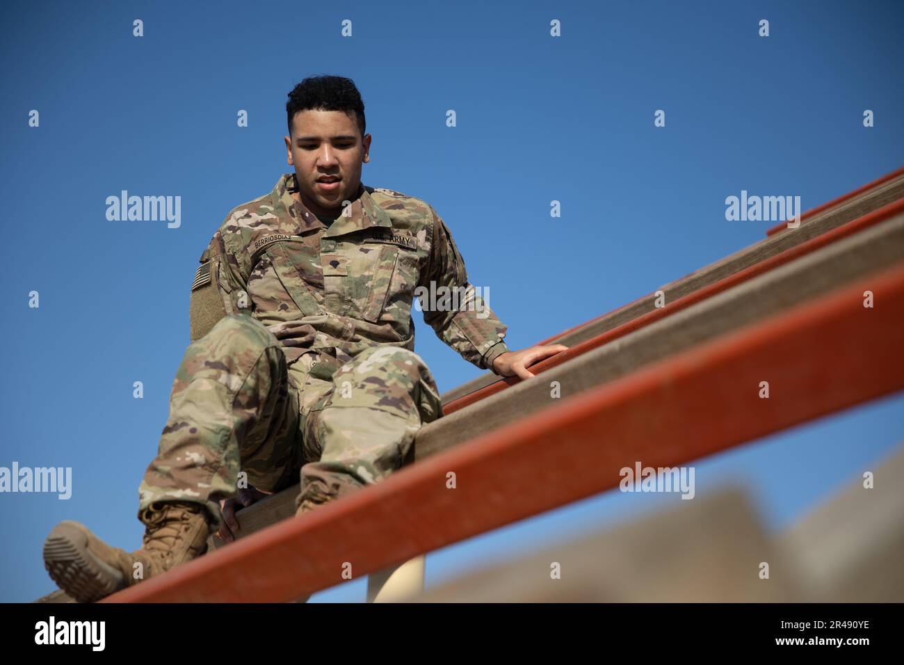 Spc. Emanuel Berrios-Rivas, a signal support systems specialist, 143rd Expeditionary Sustainment Command, completes the weaver during an air assault pre-assessment obstacle course at Camp Buehring, Kuwait Jan. 6, 2023. Soldiers were required to complete a nine-event obstacle course as a prerequisite for air assault school. Stock Photo