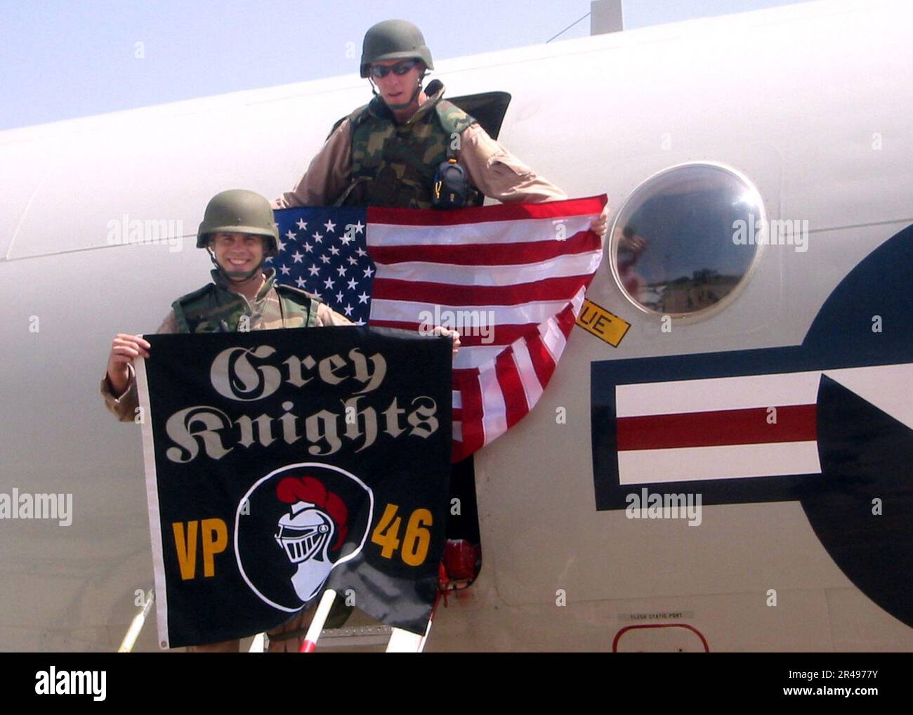 US Navy Aircrew display the American Flag and the VP-46 ''Grey Knight ...