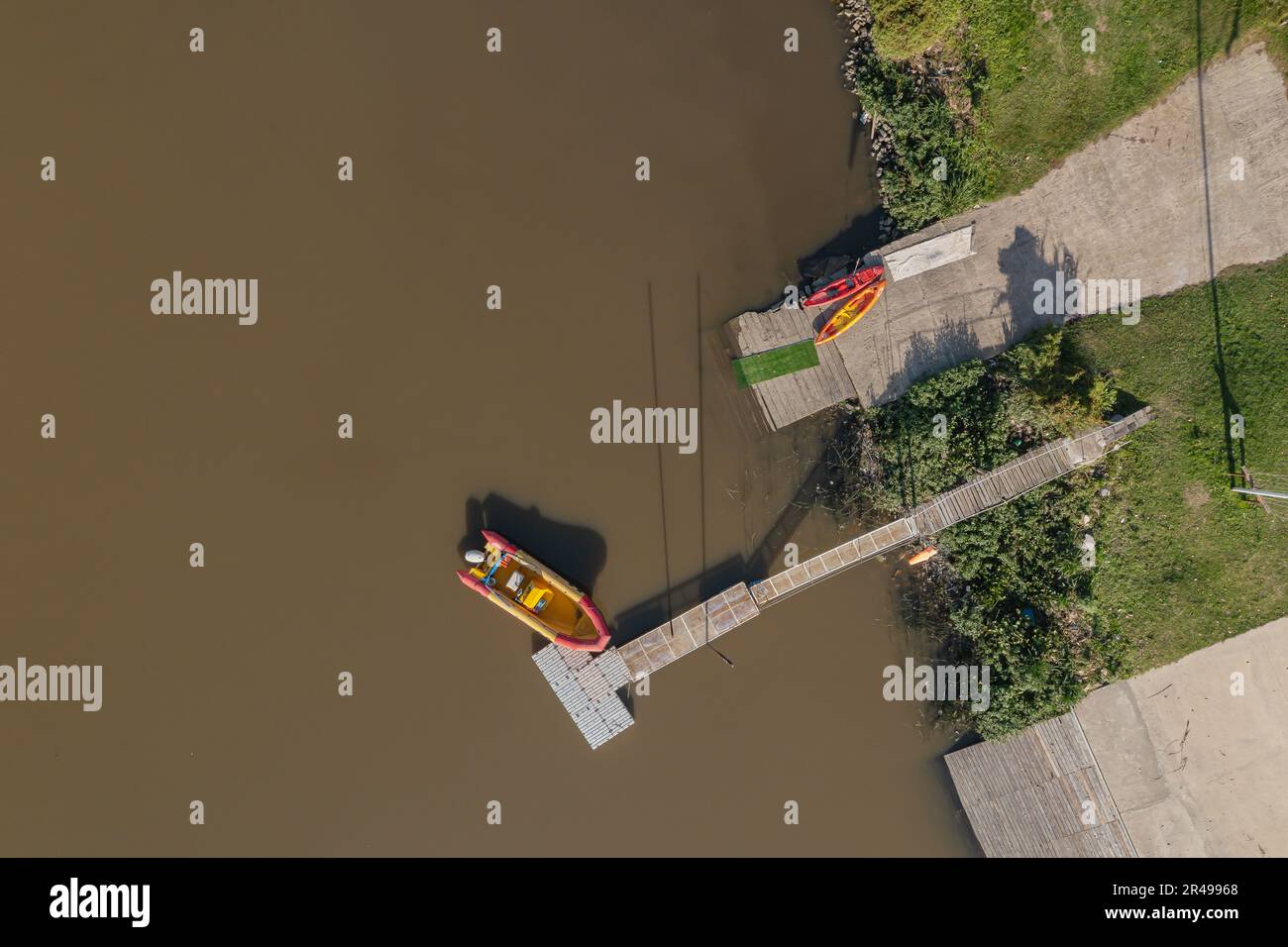 Aerial view of a boat moored at a dock. Stock Photo