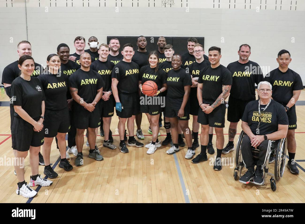 U.S. Army Soldiers takes group picture after wheelchair basketball during the U.S. Army Adaptive Sports Camp at Fort Bragg, North Carolina, April 1, 2023. Over 70 wounded, ill and injured Soldiers are training in a series of athletic events including archery, cycling, shooting, sitting volleyball, swimming, powerlifting, track, field, rowing, and wheelchair basketball. The Adaptive Sports Camp celebrates wounded, ill, and injured Soldiers ability to recover and overcome. The Army Holds qualifying trials for Active Duty, wounded, ill, or injured Soldiers to assess and select athletes for compet Stock Photo