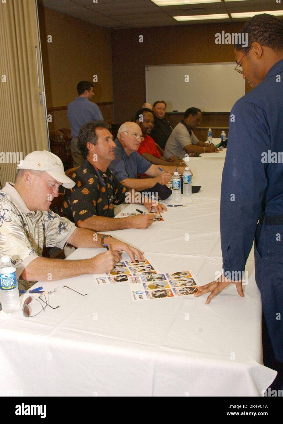 US Navy Retired professional Major League Baseball players, Graig Nettles, Fred Lynn, Harmon Killebrew, Al Oliver, and Paul Blair sign autographs for Navy personnel at Aircraft Intermediate Maintenance Depart Stock Photo